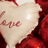 Red heart-shaped balloons and white balloons with the word "love" combined for wedding party decoration and festive atmosphere arrangement Application Scenario